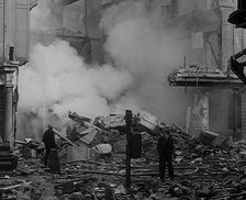 Firefighters Surrounded by Bombed Out Buildings, 1940. Creator: British Pathe Ltd.