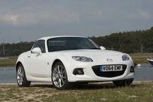 2014 Mazda MX5 Roadster Coupe Artist: Unknown.