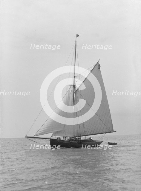 The gaff rigged cutter 'Wych' under sail, 1914. Creator: Kirk & Sons of Cowes.