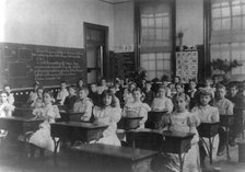 Classroom scenes in Washington, D.C. public schools: general classroom scene, 1st Division, (1899?). Creator: Frances Benjamin Johnston.