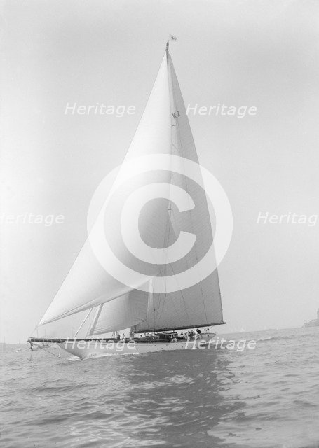 The 23-metre cutter 'Astra' sailing close-hauled, 1928. Creator: Kirk & Sons of Cowes.