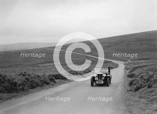 MG Magnette of KG Moss competing at the MCC Torquay Rally, July 1937. Artist: Bill Brunell.