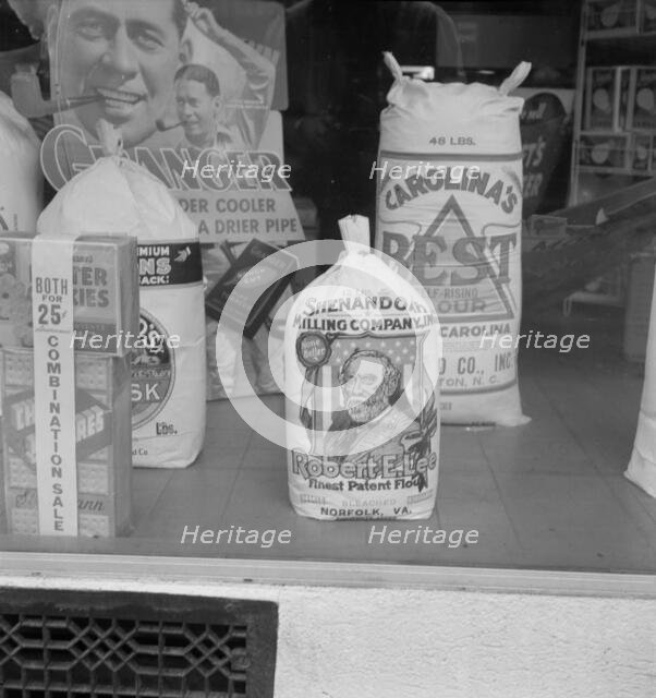 Grocery store window, Mebane, North Carolina, 1939. Creator: Dorothea Lange.