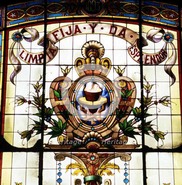 Detail of the badge of the Royal Spanish Language Academy with the motto 'Limpia, fija y da esple…