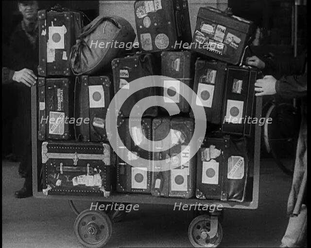 Japanese Luggage Being Wheeled Away, 1933. Creator: British Pathe Ltd.