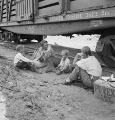 Family who traveled by freight train, Washington, Toppenish, Yakima Valley, 1939. Creator: Dorothea Lange.