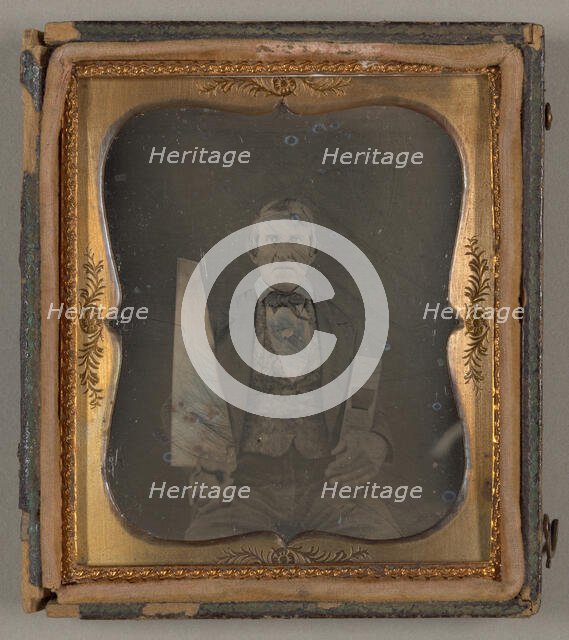 Untitled [portrait of a man holding carpentry tools], 1839/99.  Creator: Unknown.