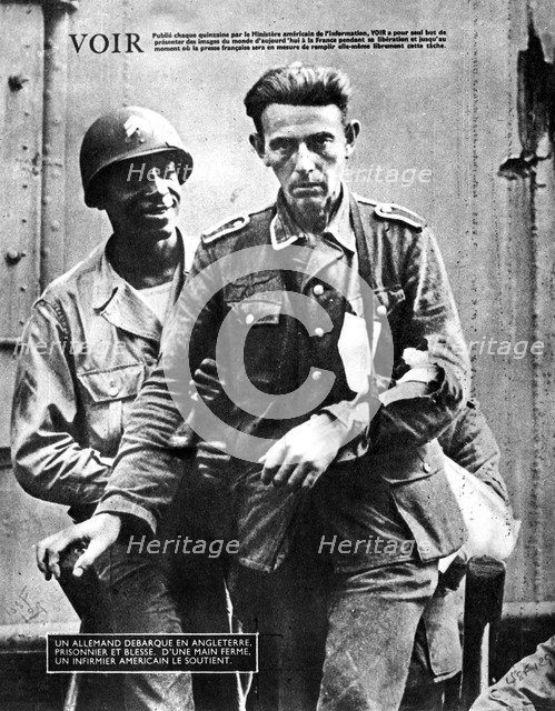 German prisoner of war arriving in England, escorted by an American soldier, 1944. Artist: Unknown