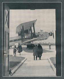 'A Symbol of the Modern World - Passengers Embarking at Croydon Aerodrome', c1935. Artist: Unknown.