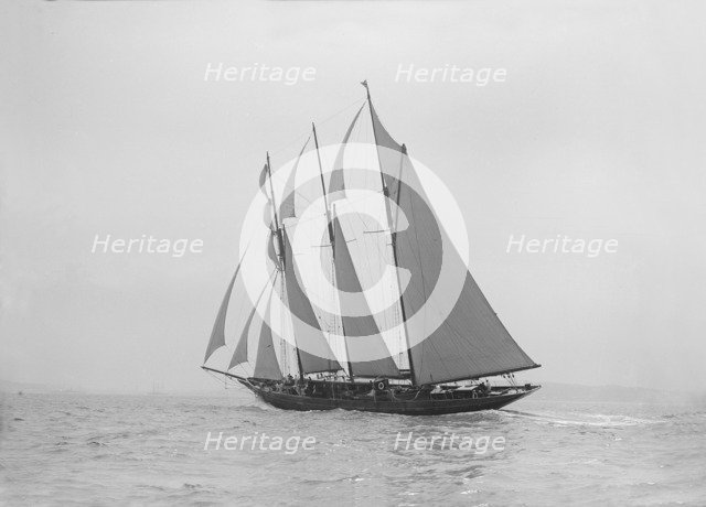 The auxiliary schooner 'La Cigale' sailing close-hauled, 1913. Creator: Kirk & Sons of Cowes.