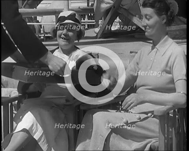 Two Female Civilians on the Deck of a Cruise Liner at Sea, 1931. Creator: British Pathe Ltd.