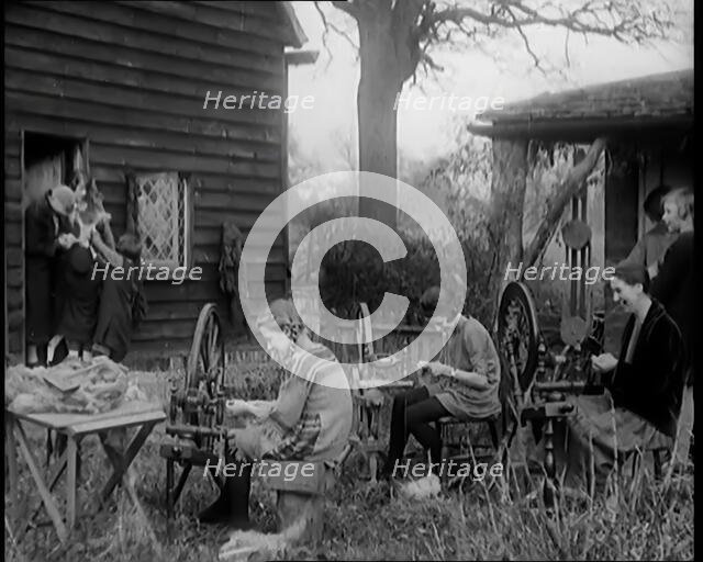 A Group of Young Girls Being Taught To Spin and Weave, 1931. Creator: British Pathe Ltd.