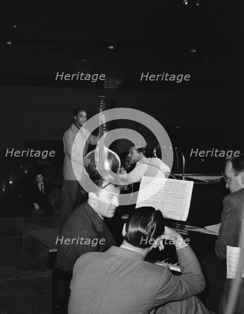 Portrait of Eddy Duchin, Wesley Prince, Nat King Cole, and Oscar Moore, New York, ca. July 1946. Creator: William Paul Gottlieb.
