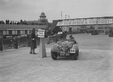 Riley Sprite of Kay Hague competing in the JCC Rally, Brooklands, Surrey, 1939. Artist: Bill Brunell.