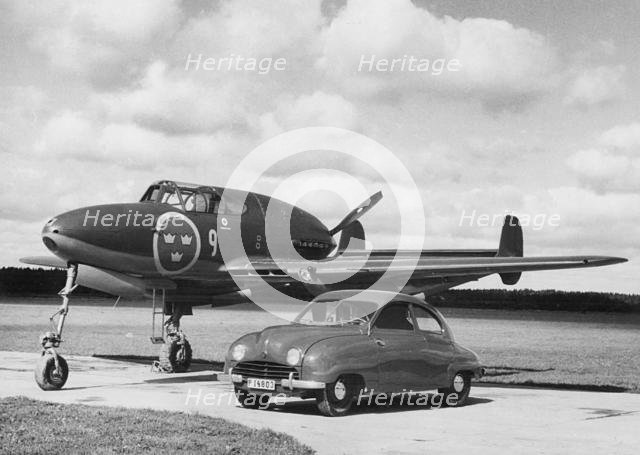 1949 Saab 92 with Saab 21 Jet Fighter plane. Creator: Unknown.