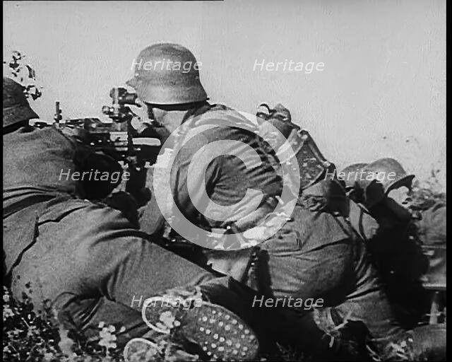 German Soldiers Firing from Cover at Dunkirk, 1940. Creator: British Pathe Ltd.