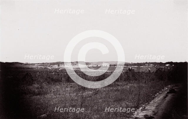 [Landscape with army encampment in the distance]. Brady album, p. 125, 1861-65. Creator: Unknown.
