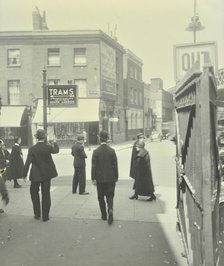 Pedestrians and tram sign outside Waterloo Station, Lambeth, London, 1929. Artist: Unknown.