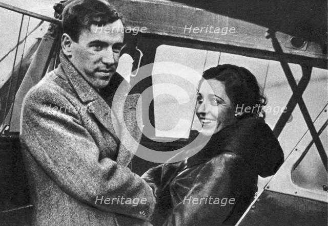 Amy Johnson, British aviator, about to set out for Cape Town, 1932. Creator: Unknown.