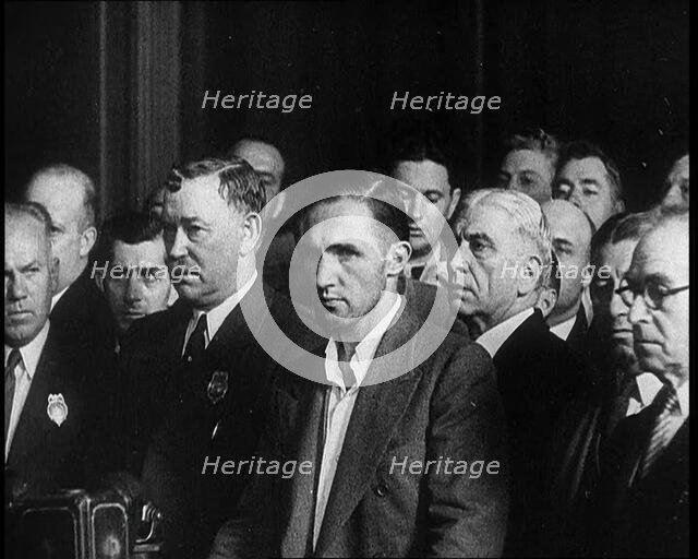 Bruno Richard Hauptmann Entering a Court Room for a Bail Hearing in Connection With the..., 1930s. Creator: British Pathe Ltd.