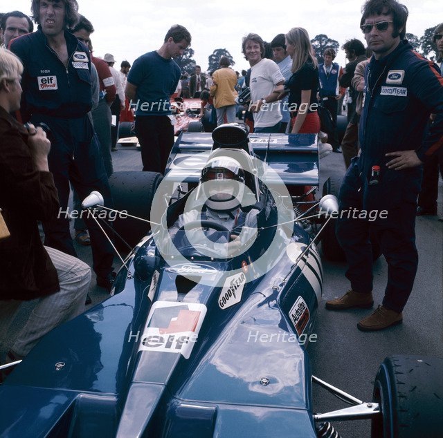 Jackie Stewart at the wheel of a racing car, driving for Tyrrell, c1971-c1973. Artist: Unknown