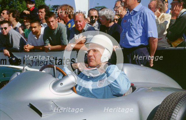 Stirling Moss prepares for the off. Goodwood festival of speed. Artist: Unknown.