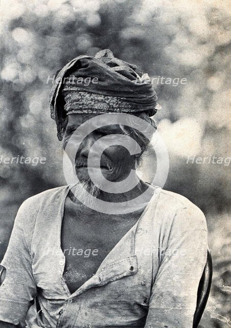 Sarawak: a Land Dayak chief, c1900. Creator: Unknown.