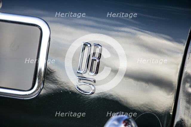 Logo on a 1965 Aston Martin DB5. Creator: Unknown.