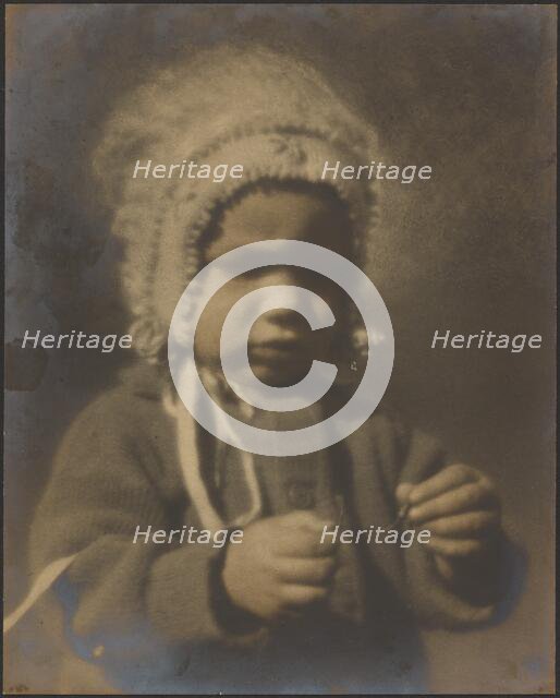Portrait of a Child Wearing a Bonnet, 1907-1943. Creator: Louis Fleckenstein.