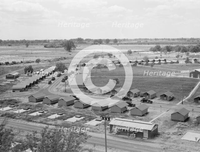 Three units of the camp, each with its sanitary..., Farmersville, Tulare County, CA, 1939. Creator: Dorothea Lange.