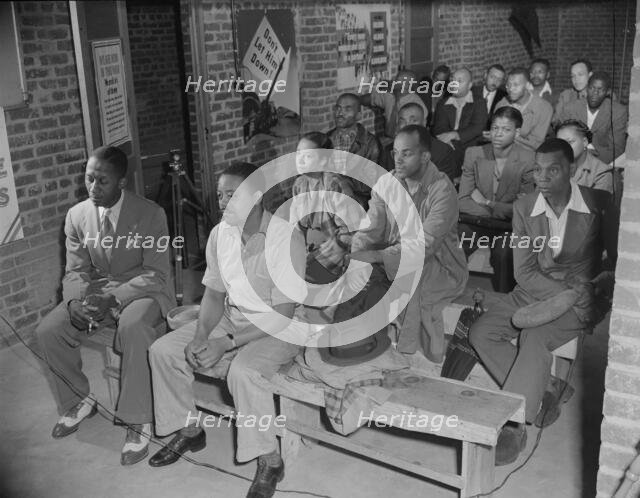 Air raid wardens' meeting in zone nine, Southwest area, Washington, D.C, 1942. Creator: Gordon Parks.