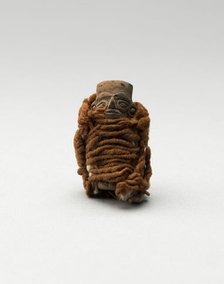Mold-Made Figurine Wrapped in Wool String, A.D. 100/600. Creator: Unknown.