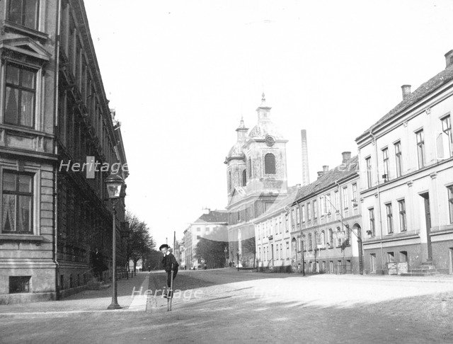 A little boy walking on stilts, Landskrona, Sweden, 1905. Artist: Unknown