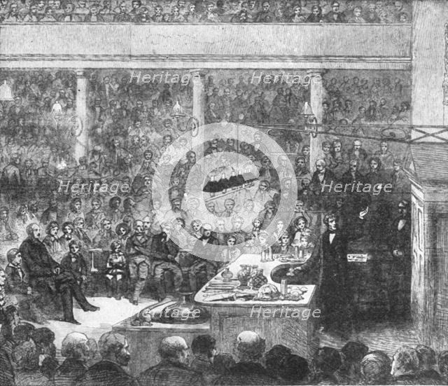 'Professor Faraday lecturing at the Royal Institute...1856', (1901).  Creator: Unknown.