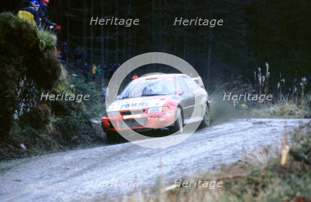 Mitsubishi  Lancer Evo,T.Makinen 1999 network q. Artist: Unknown.