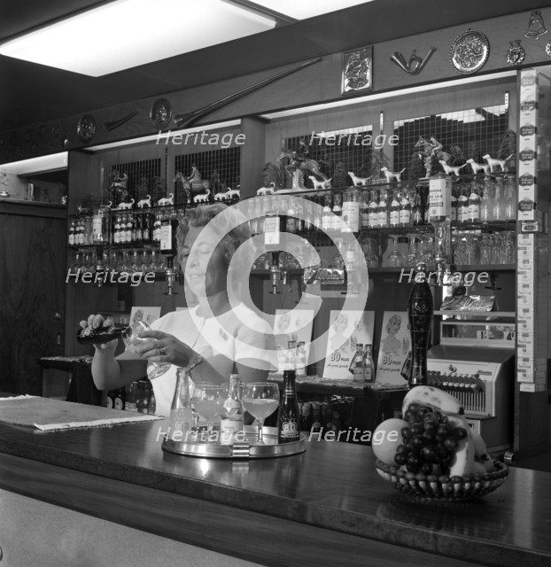 Bar of the Cavalier pub, Ravenfield, near Rotherham, South Yorkshire, 1963. Artist: Michael Walters