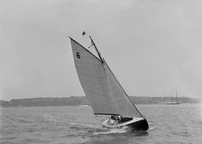 The sloop 'Genista' under sail on the River Hamble, 1920. Creator: Kirk & Sons of Cowes.