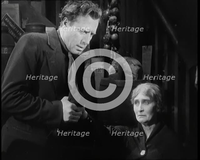 Scene from the Film 'The Informer':  Lars Hansen Arriving at the House of the Mother..., 1920s. Creator: British Pathe Ltd.