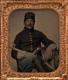 Union Cavalry Soldier, Seated, with Sword and Handgun, 1861-65. Creator: Unknown.