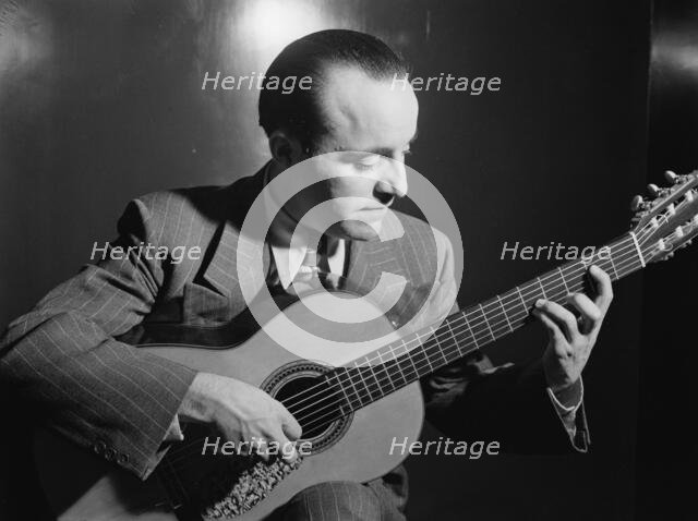 Portrait of Vincente Gomez, Café Society Uptown(?), New York, N.Y., ca. June 1946. Creator: William Paul Gottlieb.