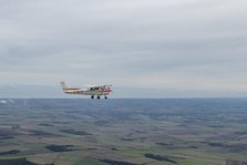 Reims-Cessna F172M Skyhawk in flight near Driffield, East Riding of Yorkshire, 2023. Creator: Chloe Pearson Jones.