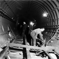 Repairing underground train tracks, London, 1955. Artist: Henry Grant
