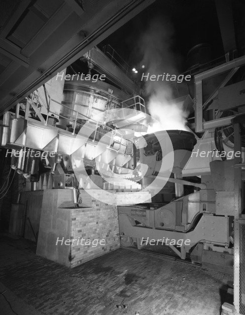 Steel pour from an electric arc furnace, Park Gate Iron & Steel Co, Rotherham, Yorkshire, 1964.  Artist: Michael Walters
