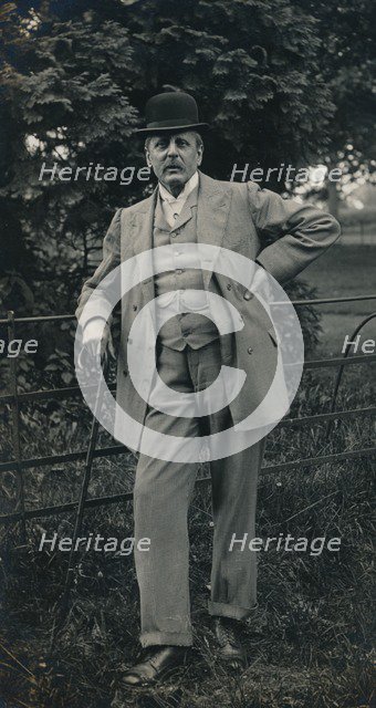 A gentleman wearing a suit and bowler hat c1910. Artist: Unknown