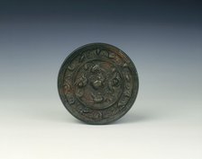 Bronze lion and grapevine mirror, Tang dynasty, China, 618-907 AD. Artist: Unknown