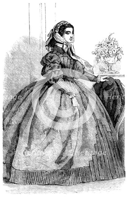 Fashions for November - Dress of Silver-Grey Silk, 1858. Creator: Unknown.