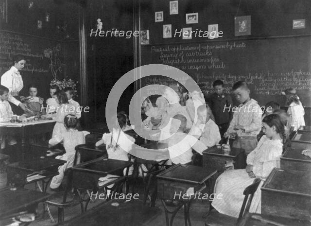 School children conducting simple experiments, Washington, D.C., (1899?). Creator: Frances Benjamin Johnston.