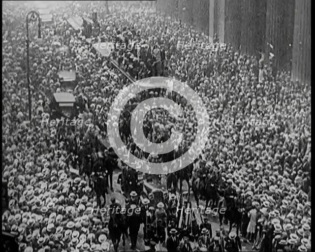 A Large Crowd Watching a Ticker Tape Parade in New York City, 1926. Creator: British Pathe Ltd.