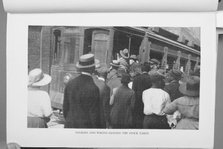 Negroes and Whites leaving the stock yards, 1922. Creator: Unknown.