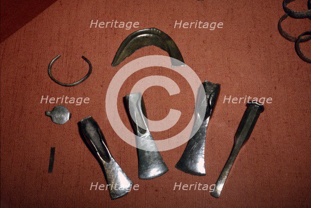 Bronze Artefacts Chisel, Axes, Sickle from Bavaria, South Germany, Bronze Age, 12th-8th century BC. Artist: Unknown.